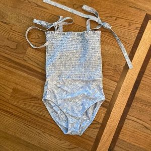 Minnow Swim x Tuckernuck smocked tie knot one piece